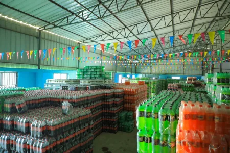 All the products of Manakamana Beverage in a factory, highlighting the wide distribution of their product range.